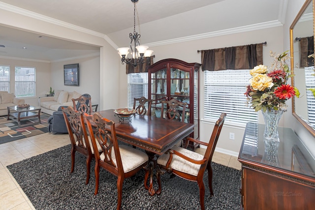 522 Arbor Green Ln, Rosenberg, TX 77469 - dining space with tile patterned flooring, a chandelier, and crown molding