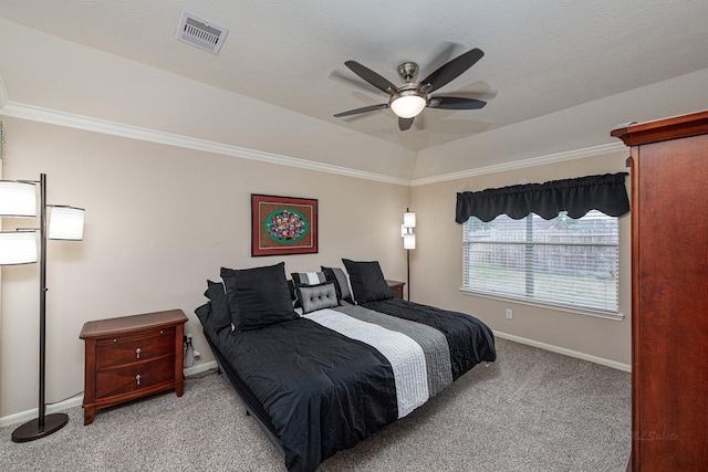 bedroom featuring baseboards, carpet, a ceiling fan, and ornamental molding