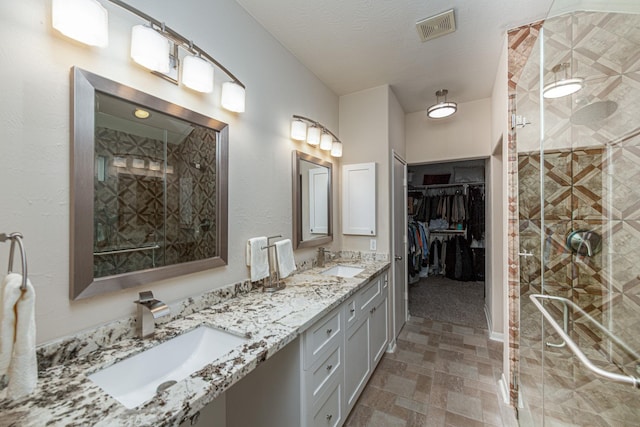 522 Arbor Green Ln, Rosenberg, TX 77469 - full bath featuring a stall shower, double vanity, and a spacious closet