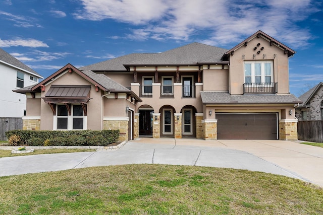 view of front of home with stone siding, concrete driveway, a balcony, and stucco siding