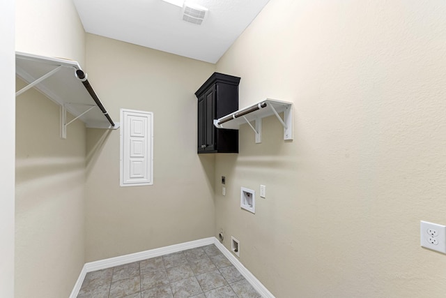 laundry room featuring hookup for a washing machine, hookup for an electric dryer, visible vents, baseboards, and cabinet space