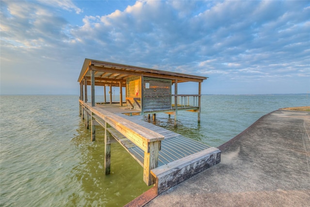 view of dock with a water view