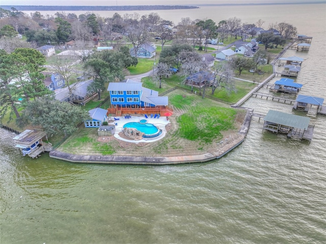 bird's eye view with a water view