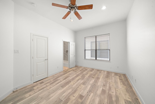 unfurnished bedroom featuring recessed lighting, light wood-style flooring, and baseboards