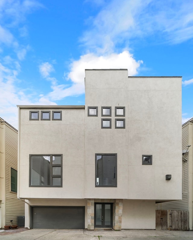 view of property featuring an attached garage