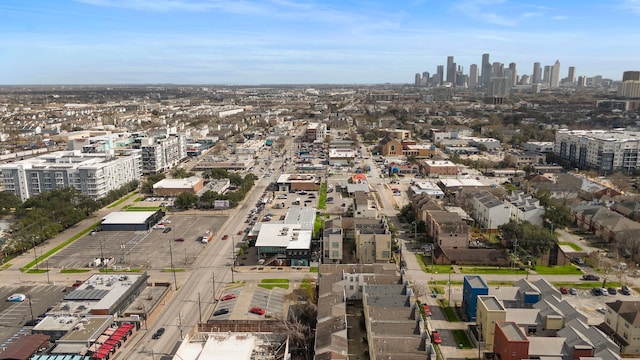 birds eye view of property with a view of city