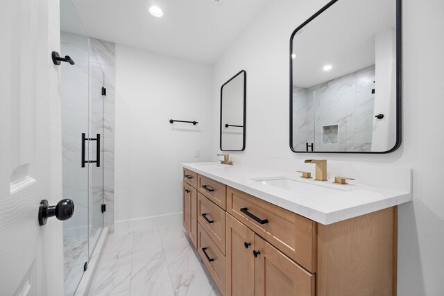 4102 Levonshire Dr, Houston, TX 77025 - bathroom with marble look tiles, a marble finish shower, recessed lighting, double vanity, and baseboards