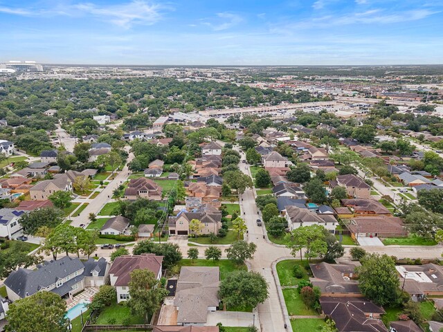 4102 Levonshire Dr, Houston, TX 77025 - aerial view of property and surrounding area with nearby suburban area
