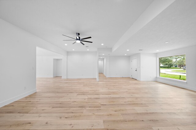 4102 Levonshire Dr, Houston, TX 77025 - unfurnished living room featuring a ceiling fan, recessed lighting, light wood finished floors, and baseboards