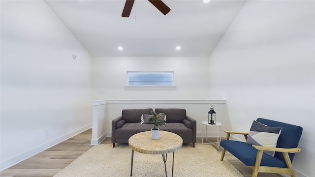 living area with light wood finished floors, ceiling fan, baseboards, and recessed lighting