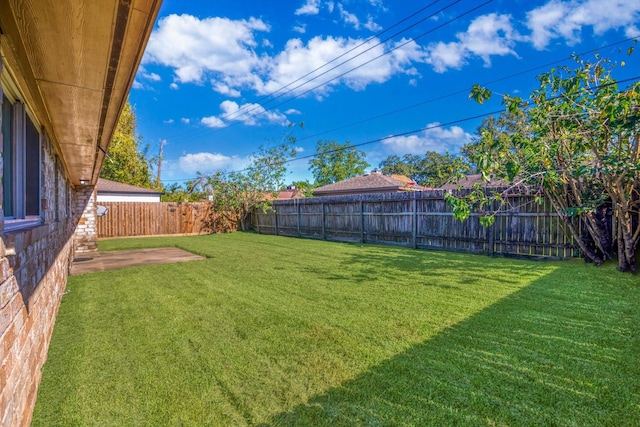 view of yard featuring a fenced backyard