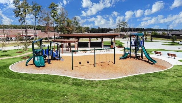 view of jungle gym featuring a lawn