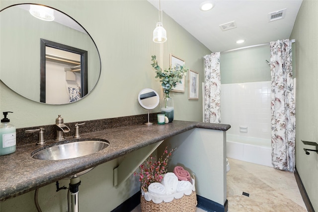 bathroom featuring recessed lighting, visible vents, a sink, and shower / bathtub combination with curtain