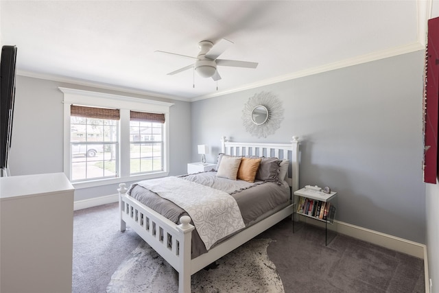 carpeted bedroom with crown molding and ceiling fan