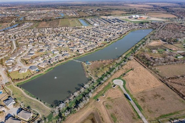 bird's eye view with a water view and a residential view