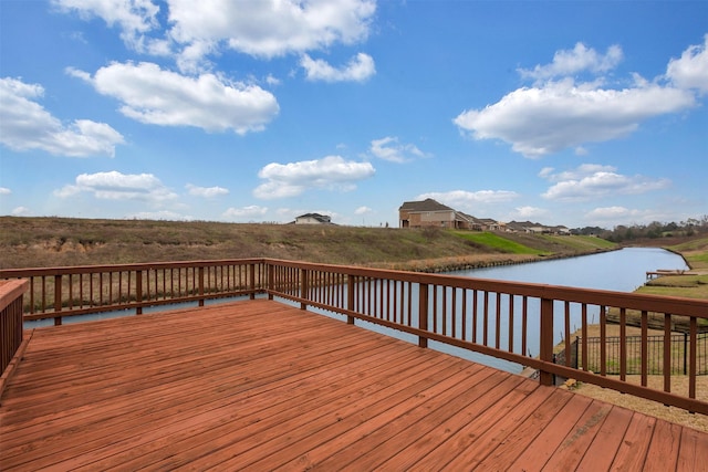 wooden deck with a water view