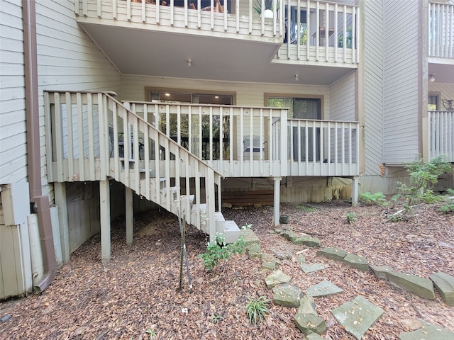 back of property with stairs