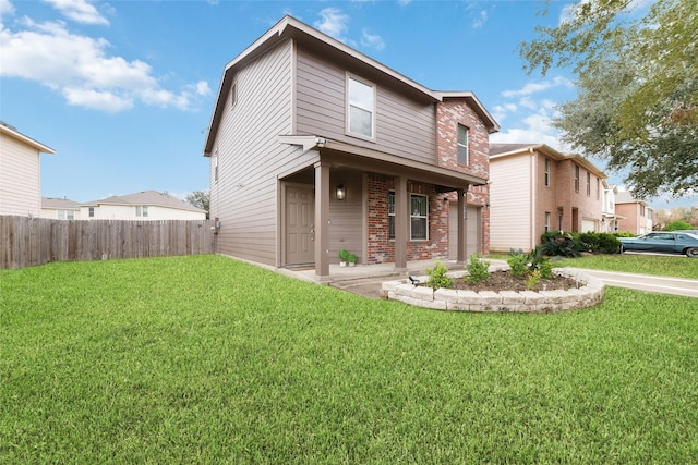 view of front of property with a front lawn