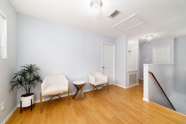 sitting room featuring light wood-type flooring