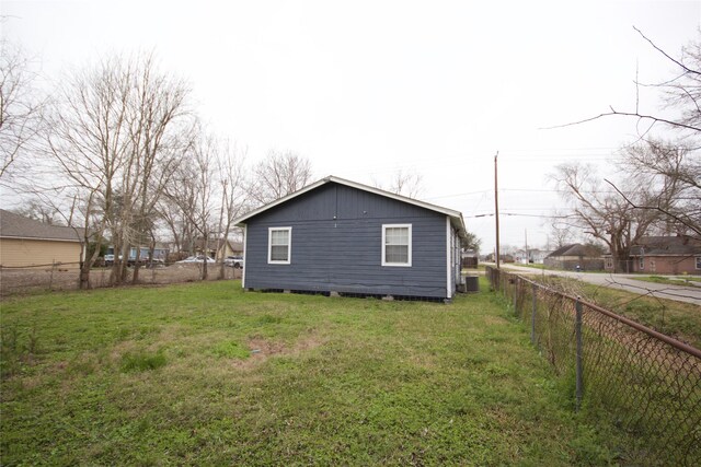 8030 Lawler St, Houston, TX 77051 - view of home's exterior with a yard