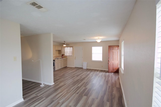8030 Lawler St, Houston, TX 77051 - unfurnished living room with hardwood / wood-style floors and ceiling fan