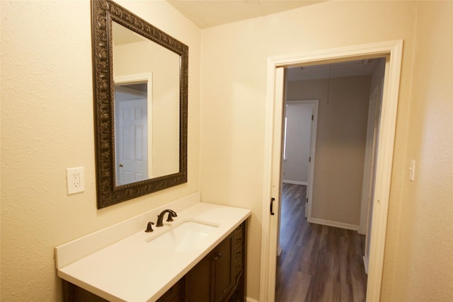 8030 Lawler St, Houston, TX 77051 - bathroom with hardwood / wood-style flooring and vanity
