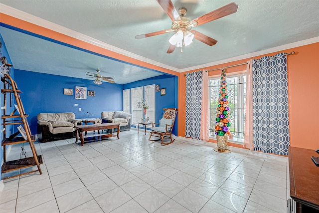tiled living room featuring ornamental molding, a textured ceiling, and ceiling fan