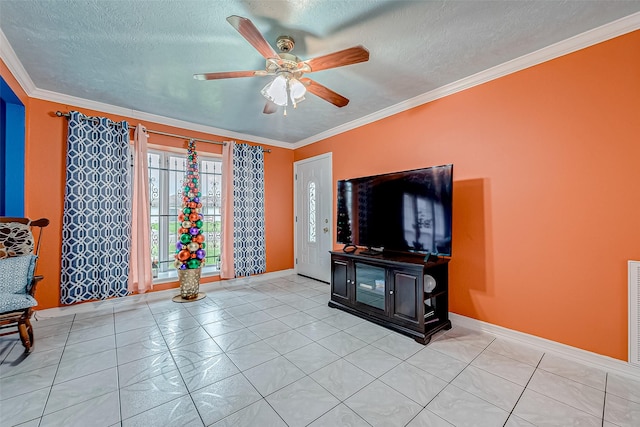 living room with a textured ceiling, crown molding, and ceiling fan