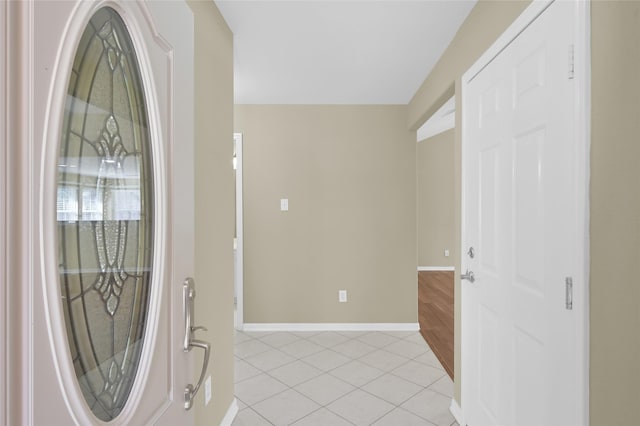 entrance foyer featuring light tile patterned floors