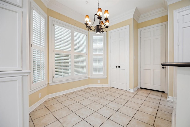 unfurnished dining area featuring a chandelier, crown molding, baseboards, and light tile patterned floors