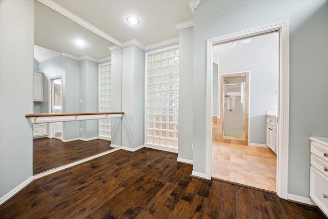 interior space featuring dark wood finished floors and baseboards