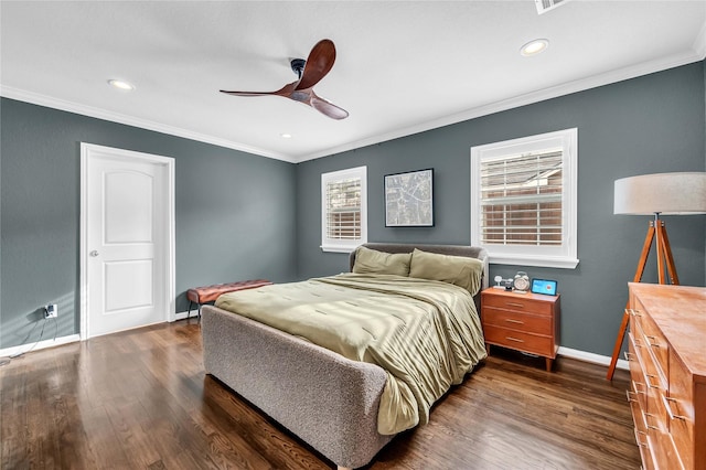 bedroom with ceiling fan, ornamental molding, and dark hardwood / wood-style floors