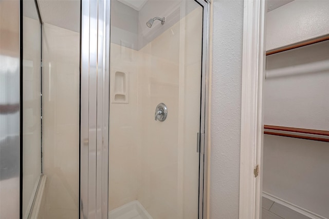 bathroom featuring a stall shower