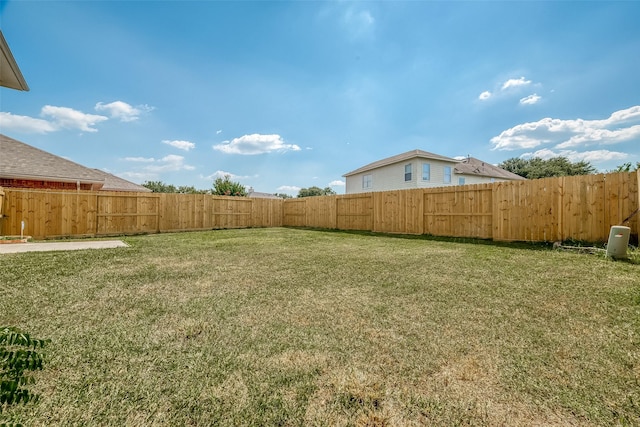 view of yard featuring a fenced backyard