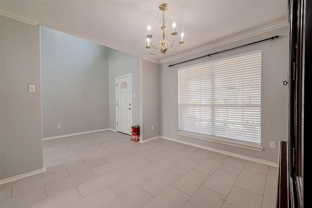 empty room featuring baseboards and a chandelier