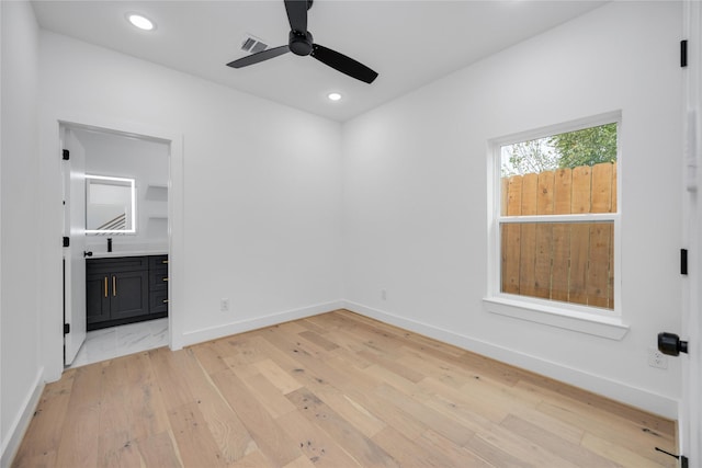 unfurnished room featuring visible vents, baseboards, recessed lighting, and light wood finished floors