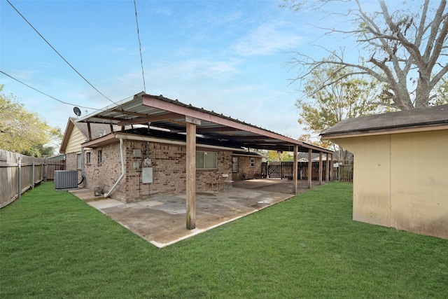 exterior space featuring central air condition unit and a fenced backyard