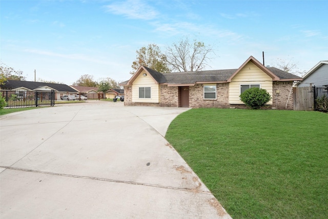 ranch-style house featuring fence, brick siding, a front lawn, and a residential view