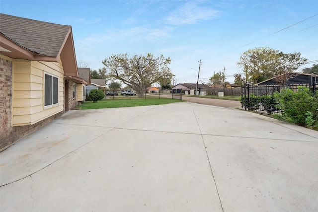 view of patio / terrace featuring fence