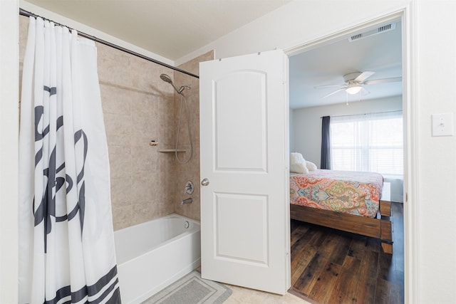 full bathroom with visible vents, ceiling fan, connected bathroom, and shower / bath combo with shower curtain