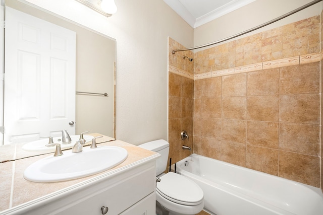 full bathroom with washtub / shower combination, toilet, vanity, and crown molding