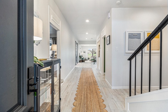 506 Fox Briar Ln, Sugar Land, TX 77478 - hallway with light wood-type flooring, recessed lighting, and baseboards