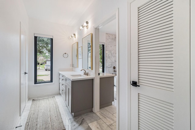 506 Fox Briar Ln, Sugar Land, TX 77478 - full bath with vanity, marble look tiles, and a shower