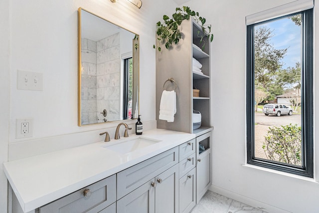 506 Fox Briar Ln, Sugar Land, TX 77478 - bathroom featuring marble look tile flooring and vanity
