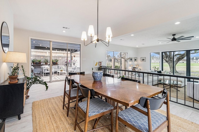 506 Fox Briar Ln, Sugar Land, TX 77478 - dining area featuring light wood finished floors, a chandelier, recessed lighting, and a ceiling fan