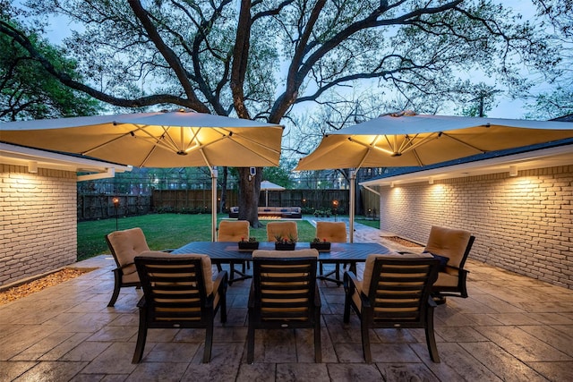 view of patio / terrace featuring a fenced backyard and outdoor dining space