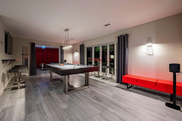 recreation room featuring visible vents, billiards, and wood finished floors