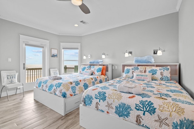 bedroom with light wood finished floors, visible vents, a ceiling fan, access to exterior, and crown molding