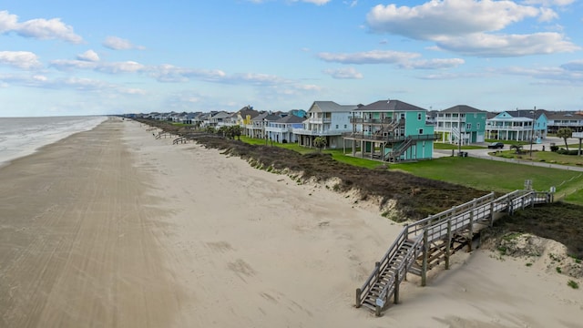 water view with a residential view and a view of the beach