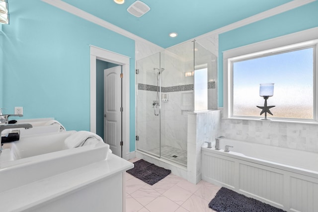 full bathroom featuring a garden tub, recessed lighting, marble finish floor, ornamental molding, and a stall shower